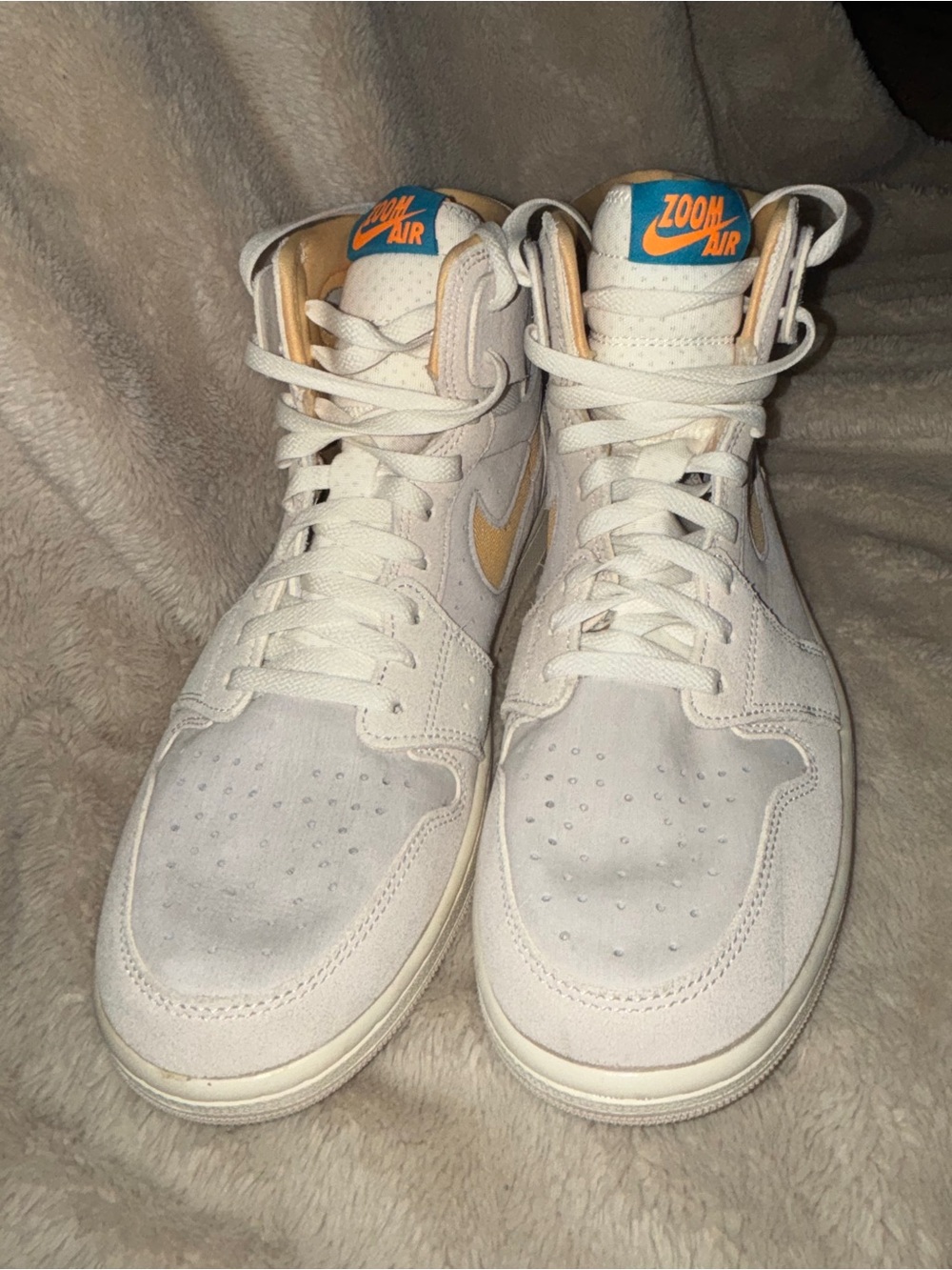 Air Jordan 1 ZM Air CMFT High-Top Sneakers in White with Orange and Blue Accents